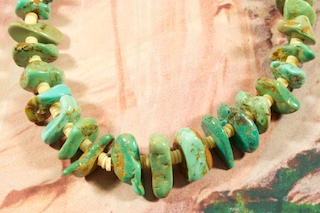 Beautiful Necklace featuring Genuine Kingman Turquoise and Melon Shell Heishi. Sterling Silver Beads and Clasp. Created by Santo Domingo Artist Carol Pacheco. The Santo Domingo Pueblo is in New Mexico, near Santa Fe.